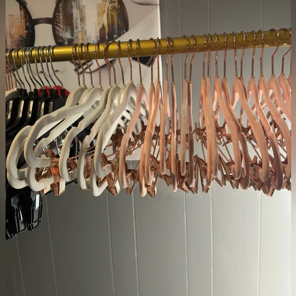 Velvet white and pink hangers.